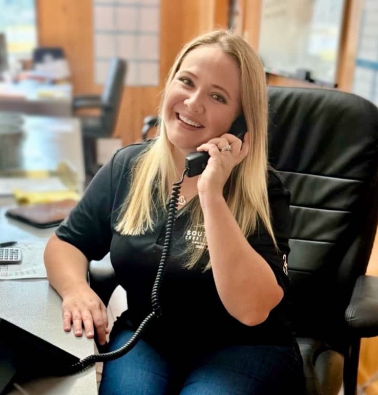 a woman sitting at a table